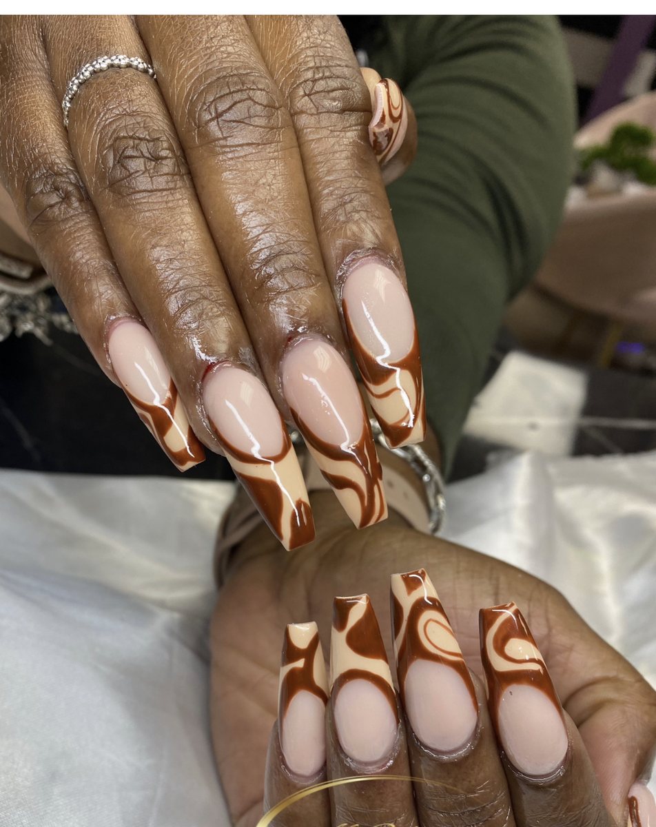 Coffin nails with brown and cream swirl french design